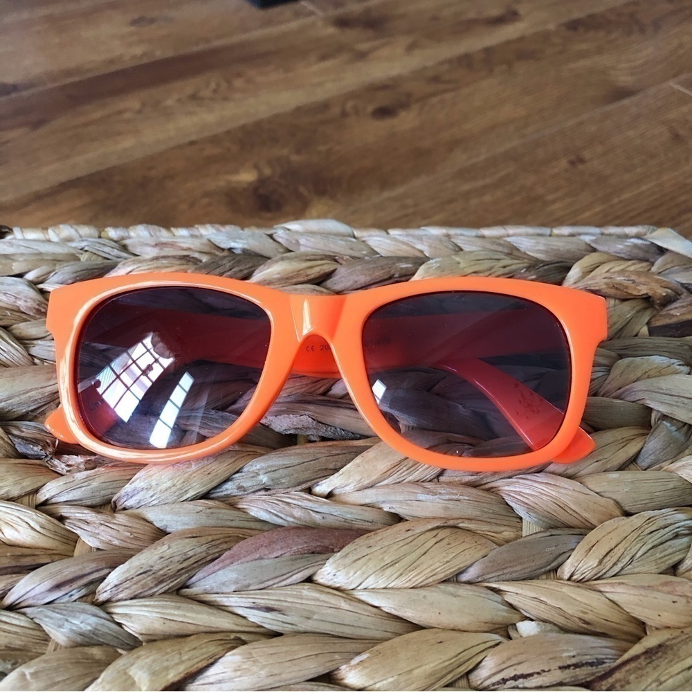 Neon orange plastic sunglasses